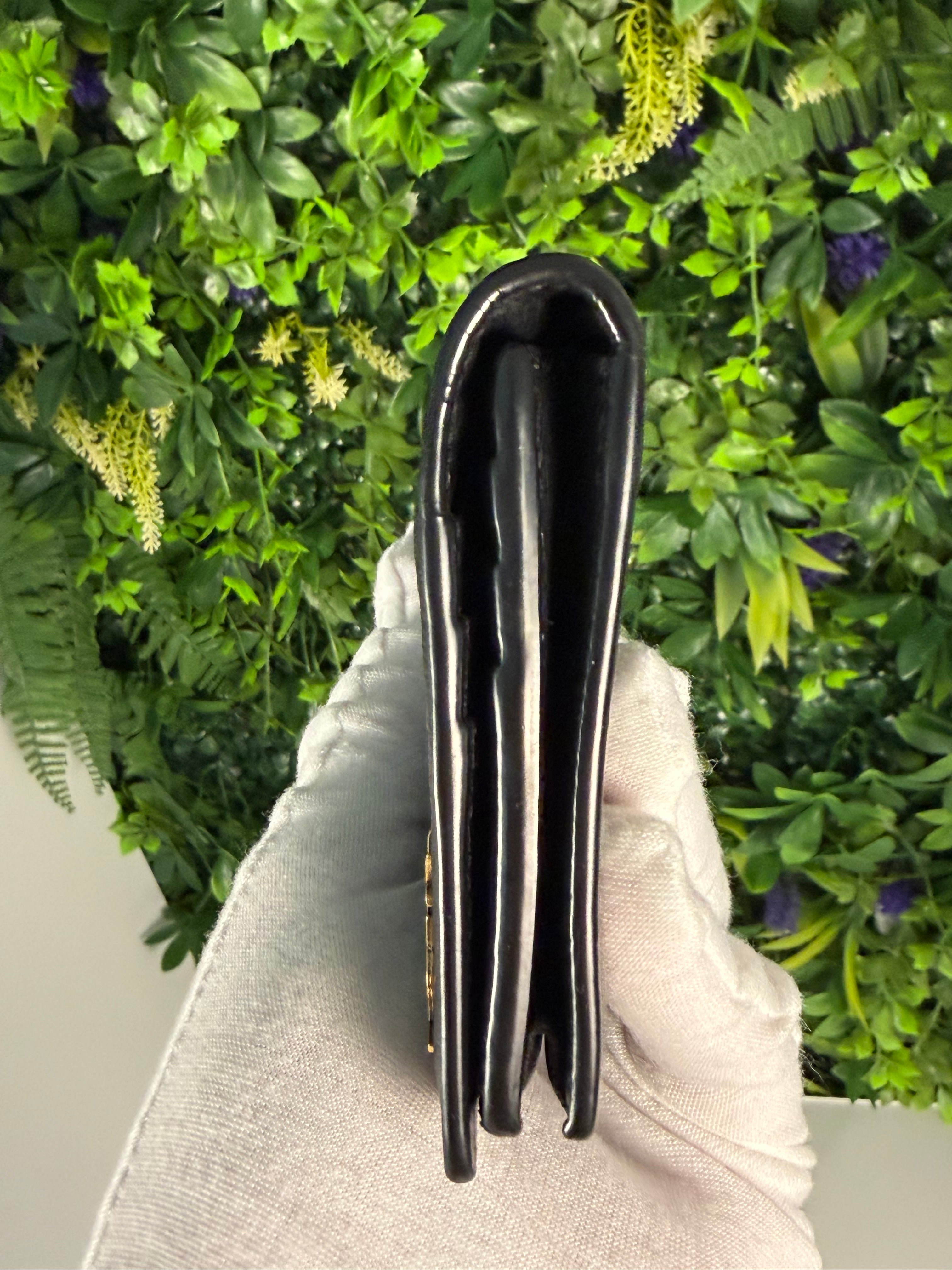 Saint Laurent Pre-Loved Cassandre Flat Wallet in Grained Leather
