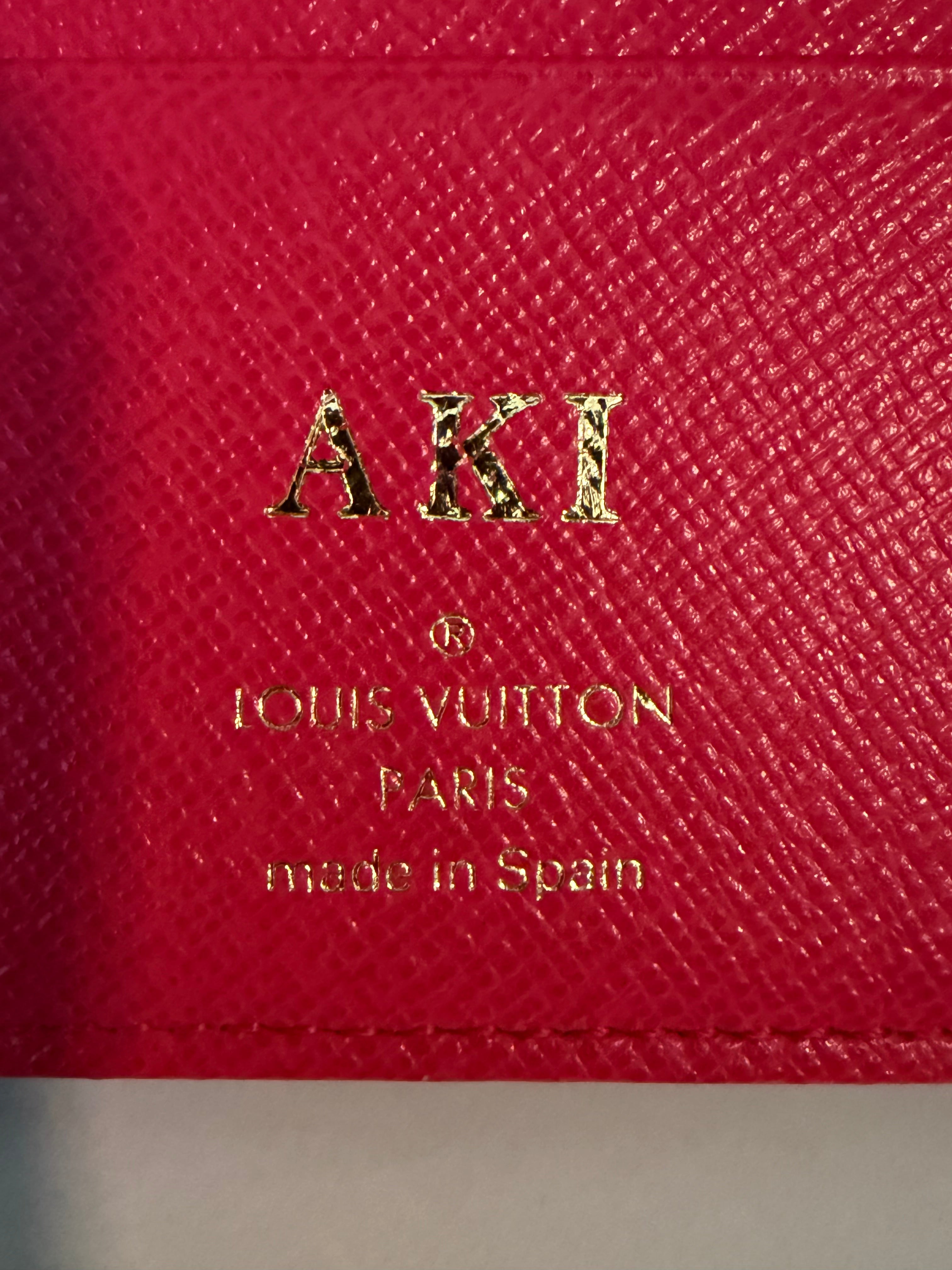 Louis Vuitton Pre-loved Monogram Insolite Wallet | Fuchsia Interior