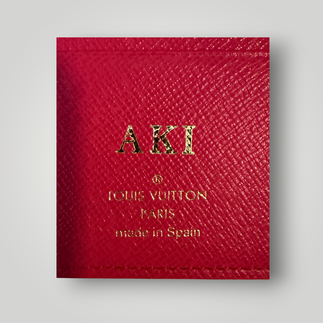 Louis Vuitton Pre-loved Monogram Insolite Wallet | Fuchsia Interior