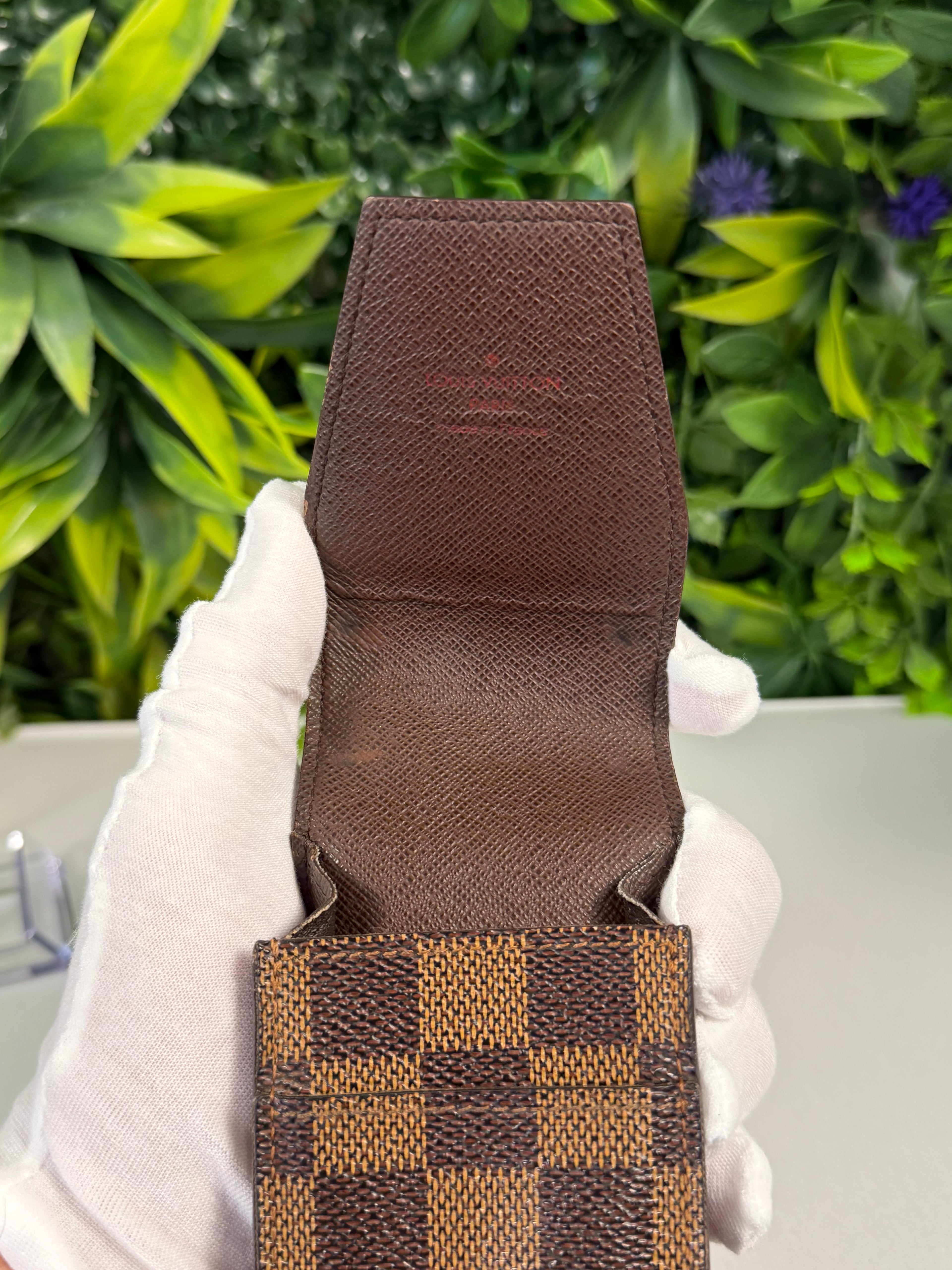 Louis Vuitton Pre-Loved Damier Ebene Mini Pouch LV-1012