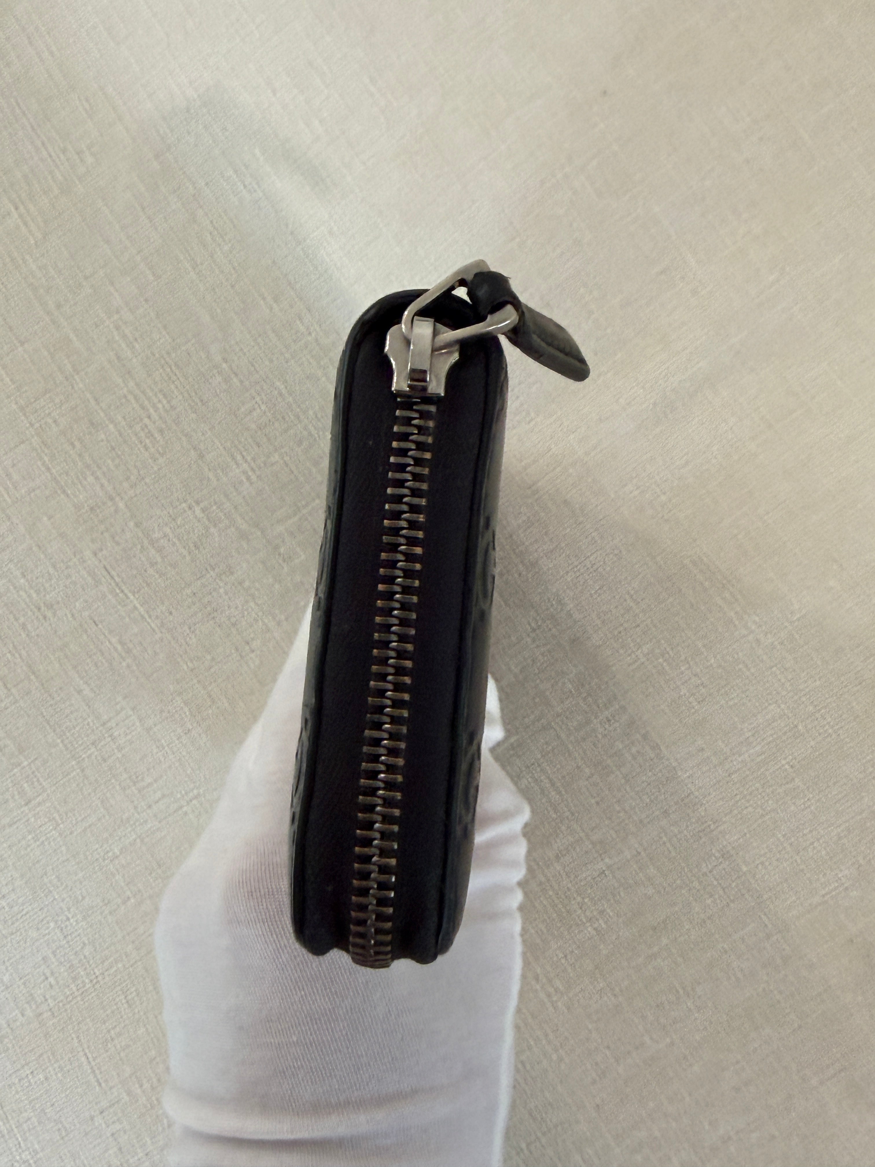 Gucci Black Guccissima Leather Zip Around Wallet