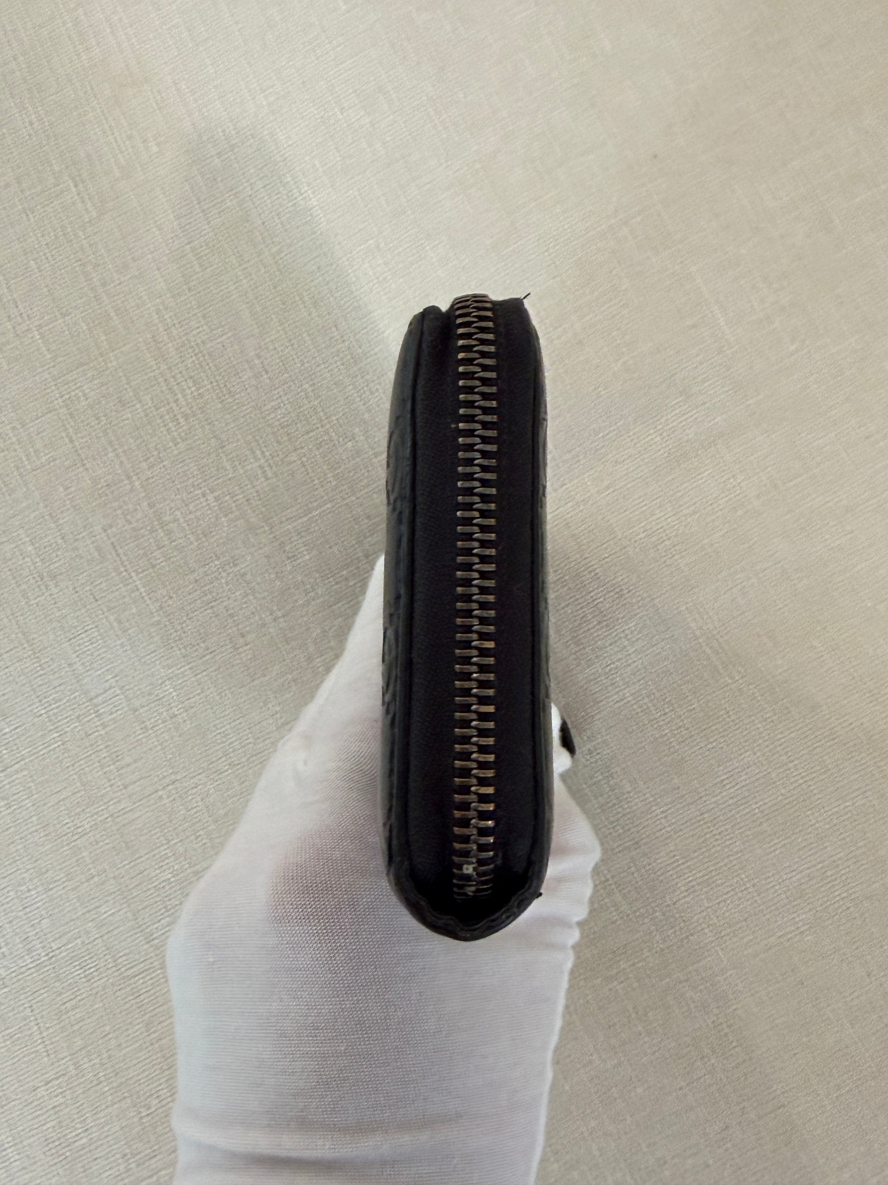 Gucci Black Guccissima Leather Zip Around Wallet