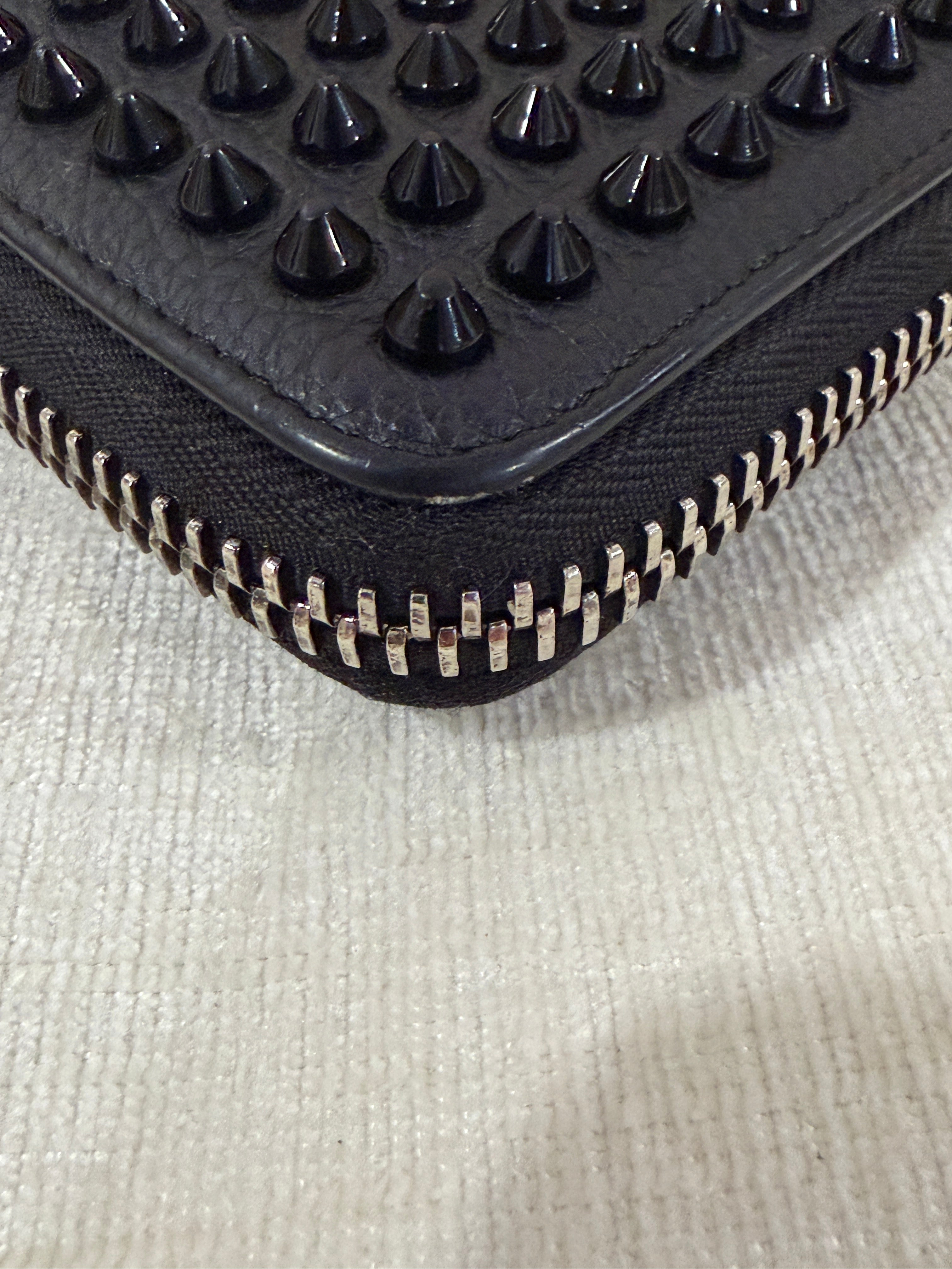 Christian Louboutin M Panettone Wallet
Grained Calf Leather & Spikes – Black CL-1002