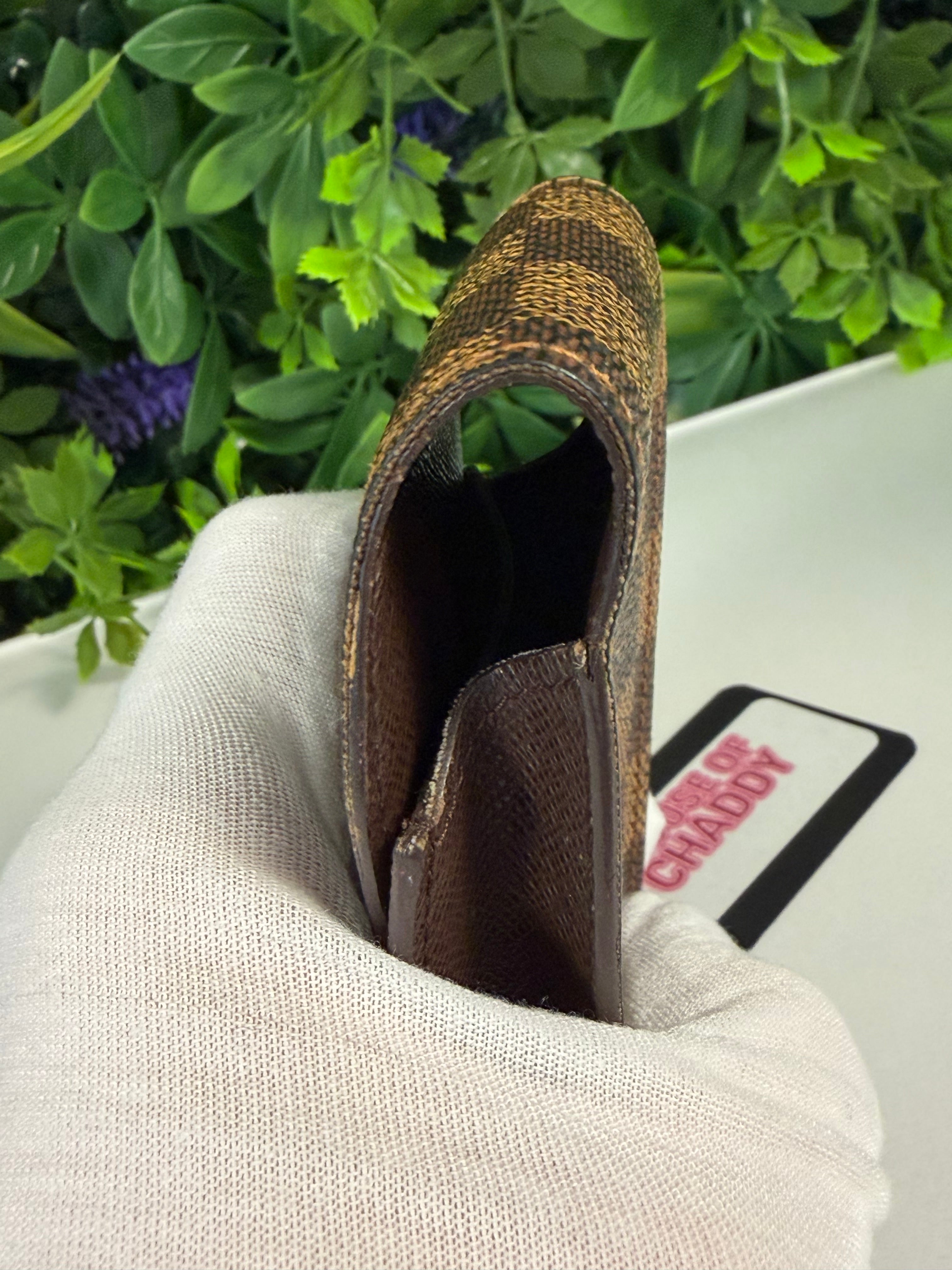 Louis Vuitton Pre-Loved Damier Ebene Mini Pouch LV-1012