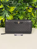 Gucci Pre-Loved Guccissima Bowtie Zippy Wallet