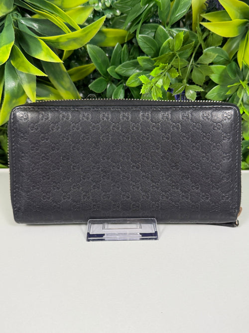 Gucci Pre-Loved Guccissima Bowtie Zippy Wallet