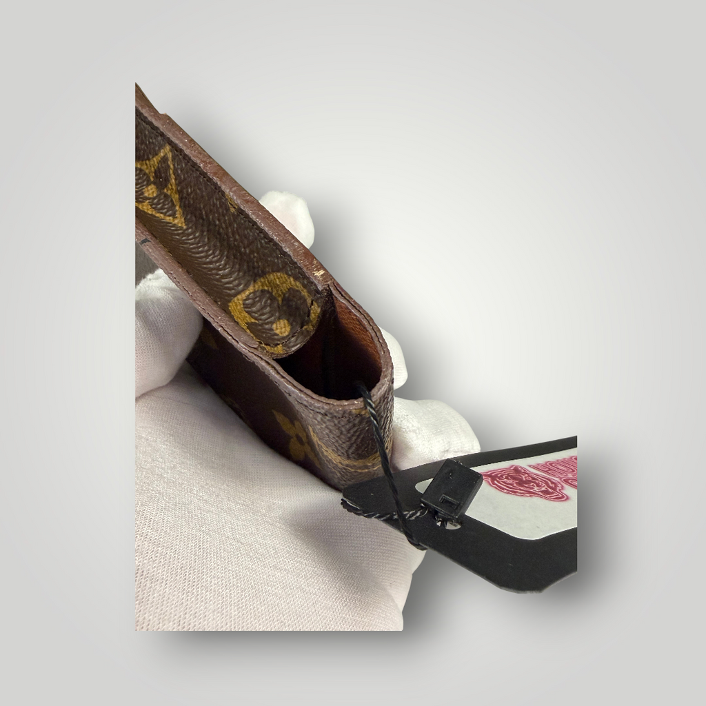 Louis Vuitton Pre-Loved Monogram Mini Pouch LV-1002