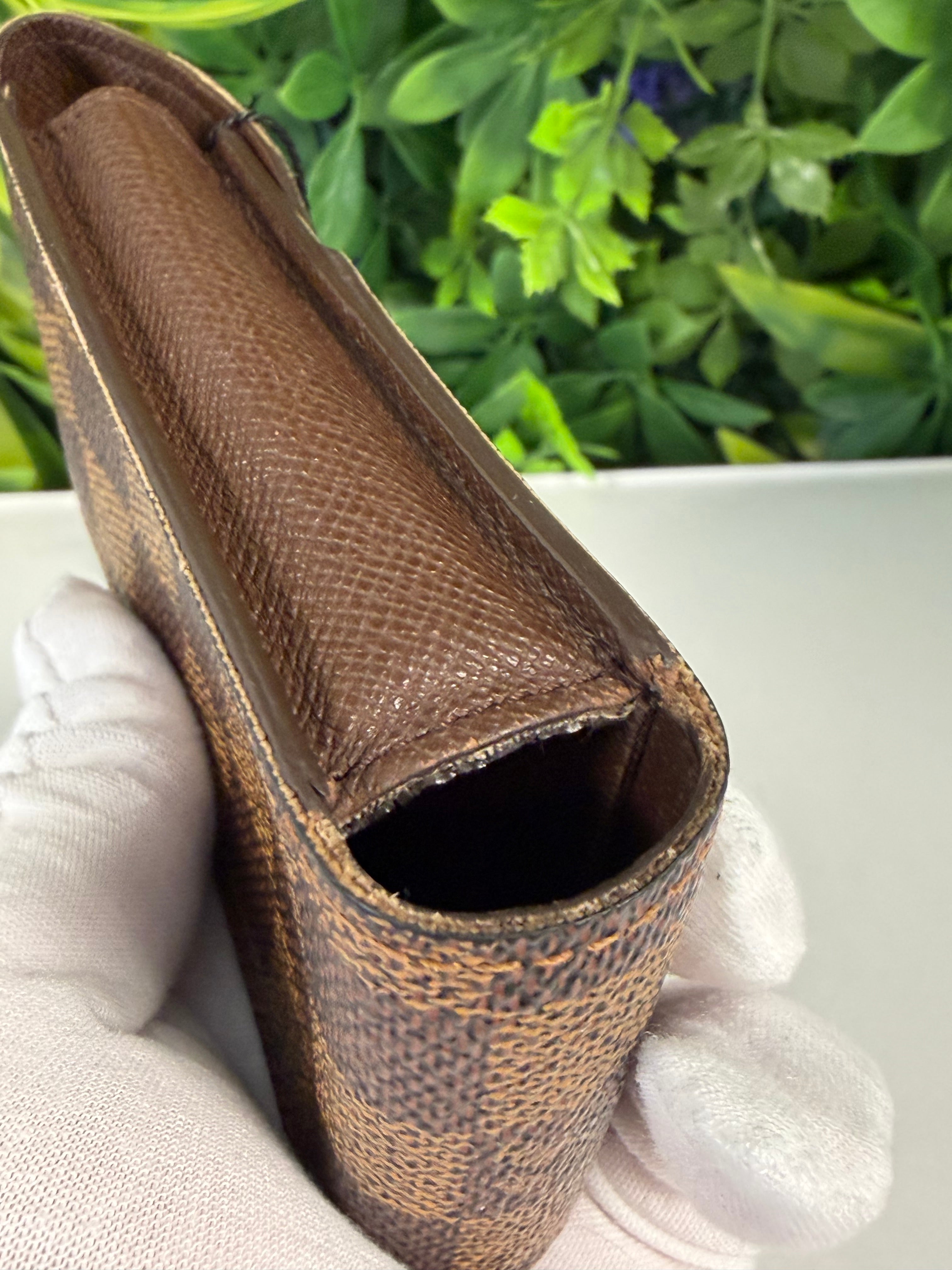 Louis Vuitton Pre-Loved Damier Ebene Mini Pouch LV-1013
